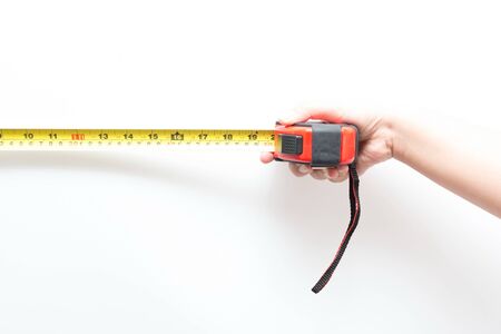 Asian woman holding red metering tool, isolatedの写真素材