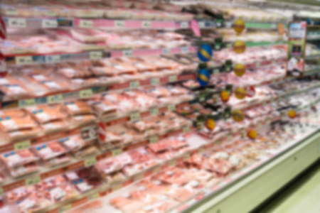 Supermarket blur background with miscellaneous product shelf useful for shopping conceptsの写真素材