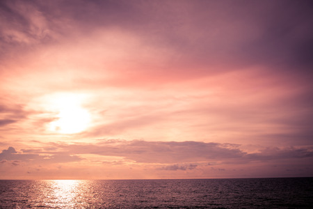 Beach sunset. Beach at sunset with ocean waves and dramatic high contrast filter. Taken at Thailand empty golden beach.の写真素材