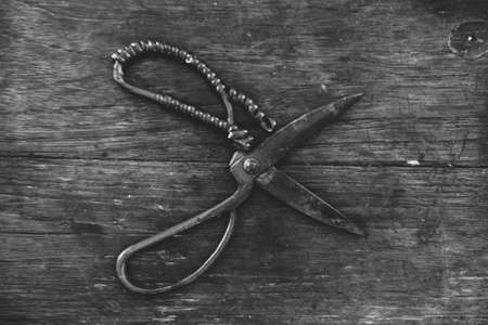 Vintage Scissor on Vintage Wood Tableの写真素材