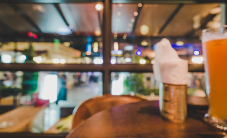 Blurred dining at bar with bokeh backgroundの写真素材