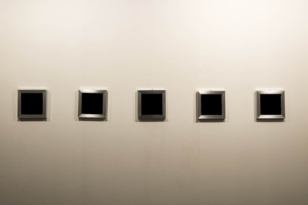 Empty photo frame in modern galleryの写真素材