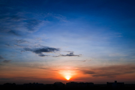Silhouette rural town and sky in sunriseの写真素材