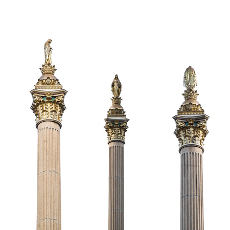 golden Mary statue on roman post isolated on white backgroundの写真素材