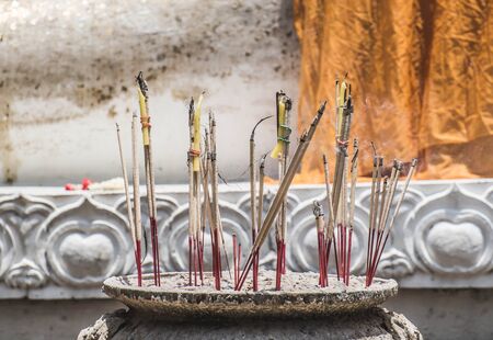 Joss sticks for salute Buddhaの写真素材