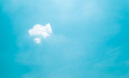 nice single cloud on blue skyの写真素材