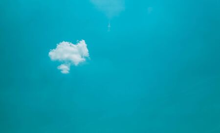 nice single cloud on sky. vintage toneの写真素材