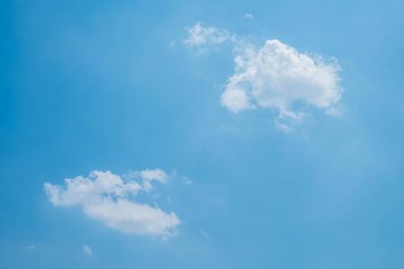 two clouds on the skyの写真素材