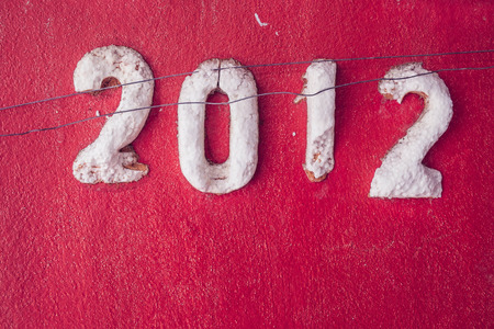 2012 on retro maroon wallの写真素材