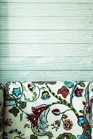 retro wood panel and armchairの写真素材