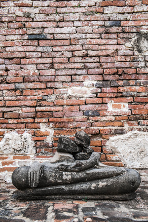 broken ancient Buddha statueの写真素材