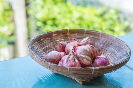 garlic in basketの写真素材