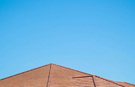 Roof exterior on blue sky backgroundの写真素材