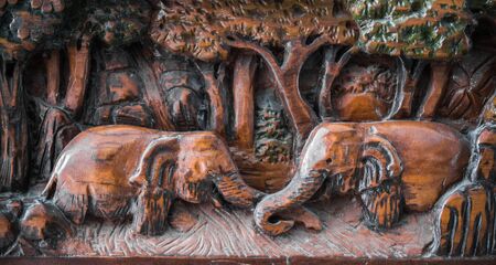 Wooden carved elephants from Thailandの写真素材