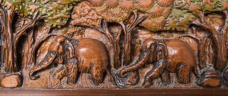 Wooden carved elephants from Thailandの写真素材