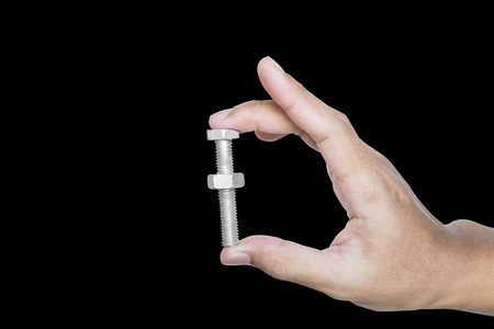Hand holding knot screwの写真素材