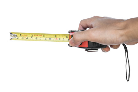 Hand holding nylon measurement tapeの写真素材