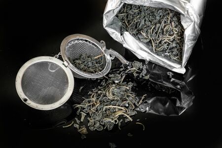 dry tea and strainer, preparing for brew upの写真素材