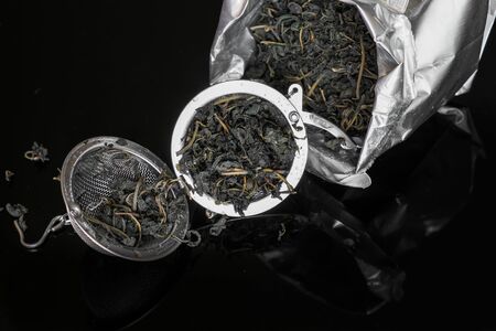 dry tea and strainer, preparing for brew upの写真素材