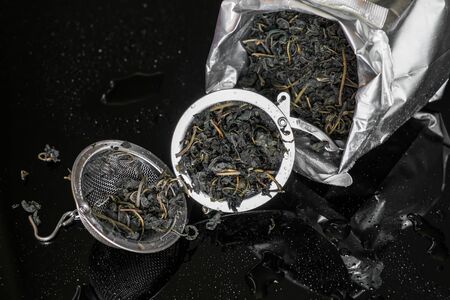 dry tea and strainer, preparing for brew upの写真素材