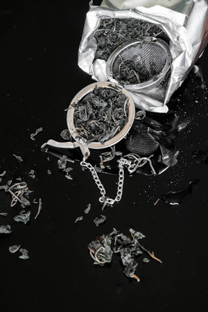 dry tea and strainer, preparing for brew upの写真素材