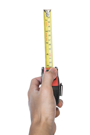 Hand holding nylon measurement tapeの写真素材