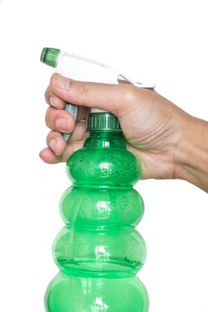 Male hand holding spray bottleの写真素材