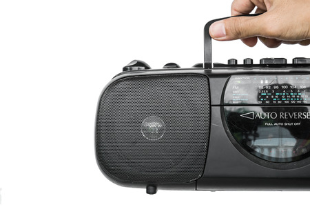 Close-up hand holding old retro audioの写真素材