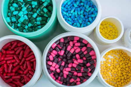 colorful pill in bottlesの写真素材