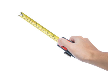 Hand holding nylon measurement tape, selective focusの写真素材