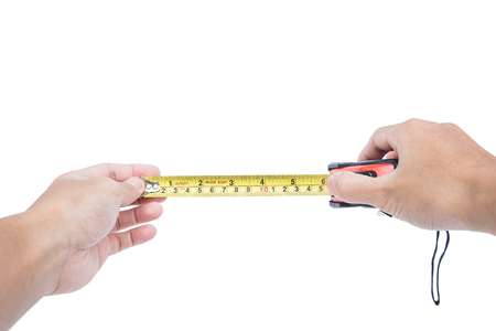 Hand holding nylon measurement tape, selective focusの写真素材