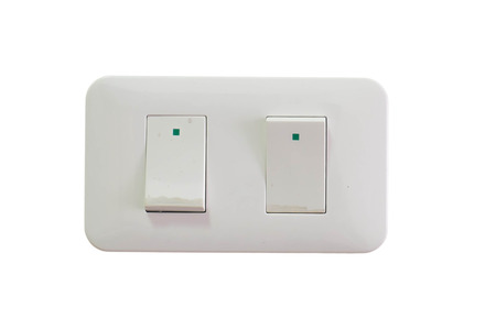 Electric light switch, isolated on white backgroundの写真素材