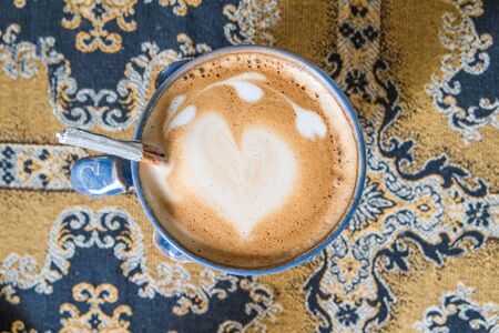 Latte art coffee, vintage toneの写真素材
