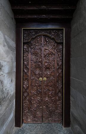 antique wooden door with wooden frameの写真素材