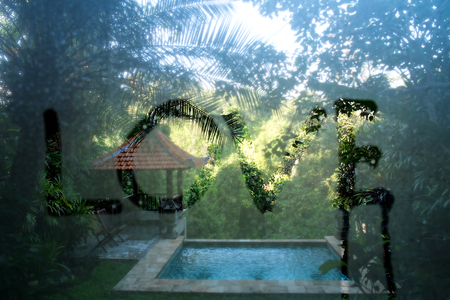 the word "LOVE", draw on hazy glass in the morningの写真素材