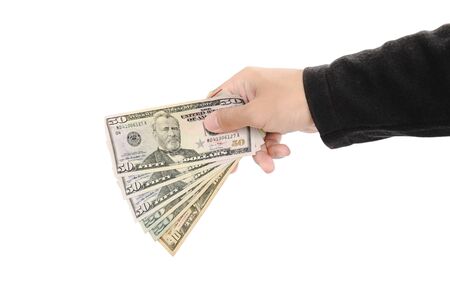 Hand holding cash, isolated on white backgroundの写真素材