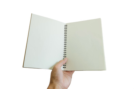 Hand holding opened notebook, isolated on white backgroundの写真素材