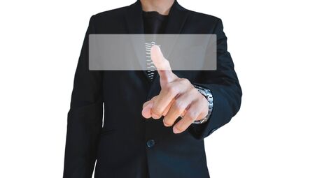 Businessman in casual suit push digital screen, isolated on white background, selective focus on handの写真素材