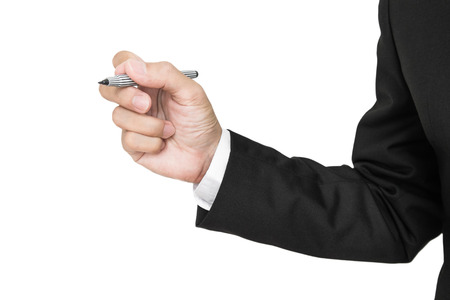 Businessman's hand holding pen in writing position on screen, isolated on white backgroundの写真素材