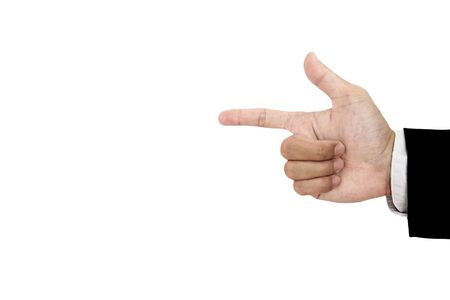 Hand of businessman in suit showing gun sign, isolated on white backgroundの写真素材