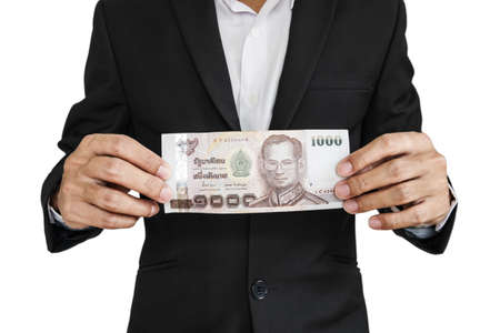 Businessman holding cash, isolated on white backgroundの写真素材