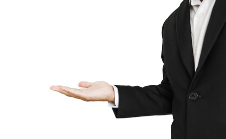 Businessman extending hand to presenting something, isolated on white backgroundの写真素材
