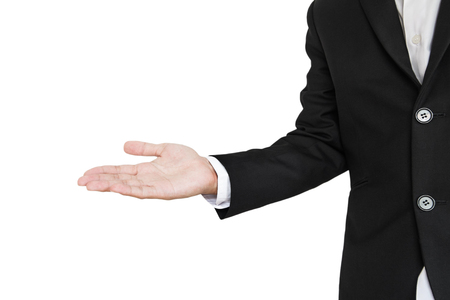 Businessman extending hand, presenting something, isolated on white backgroundの写真素材