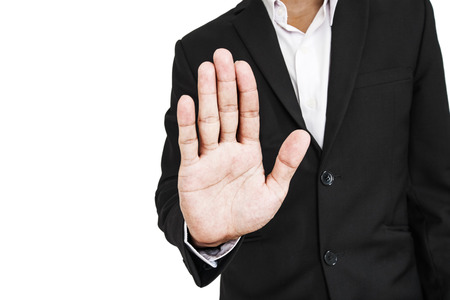 Businessman showing palm hand, concept of denialの写真素材