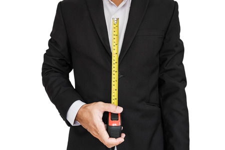 Businessman holding measurement tape, isolated on white backgroundの写真素材