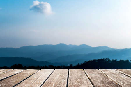 Wooden pier with de focus mountains viewの写真素材