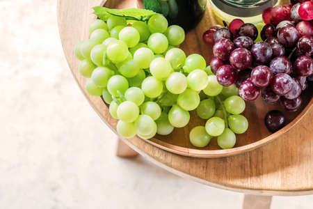 Grapes on wooden tableの写真素材