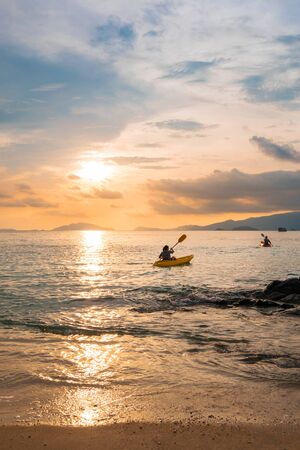 kayaking in summer at sunset, vintage tone, abstract conceptの写真素材
