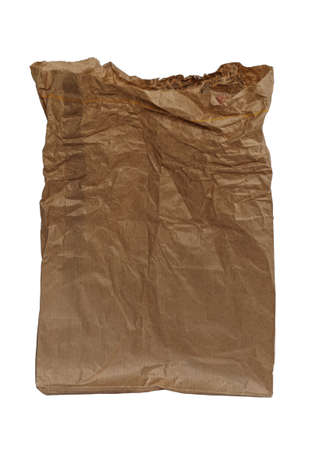 Crumpled brown paper bag, isolated on white backgroundの写真素材
