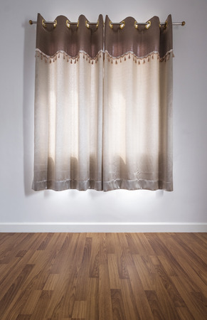 Wooden floor with white wall, and curtainの写真素材